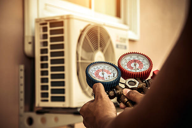 Professional Hvac technician working in Milan, IL